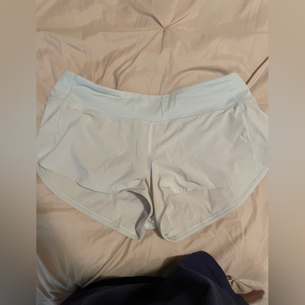 size eight lululemon speed up shorts in light blue